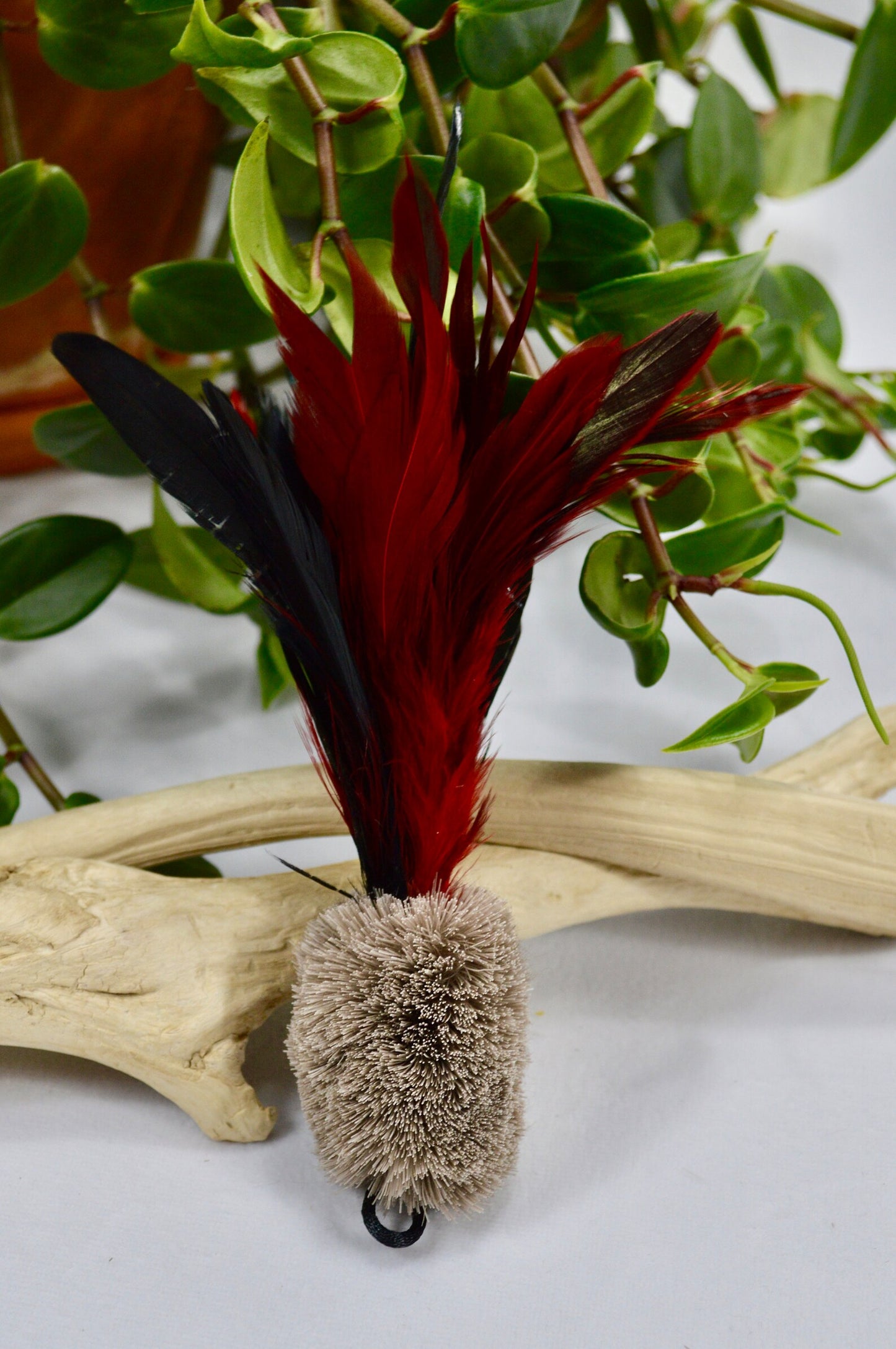 Caribou Hide & Rooster Feather Rod Attachment